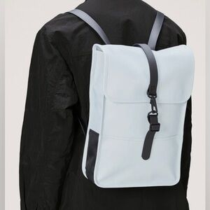 Brand new RAINS Backpack in color Sky